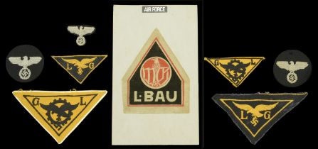 German Second World War Luftwaffe Insignia. Two separate sizes of the black embroidered ins...