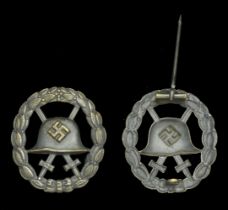 A M.1936 Spanish Civil War Wound Badge in Black with Fretted-out Swords. A very good qualit...