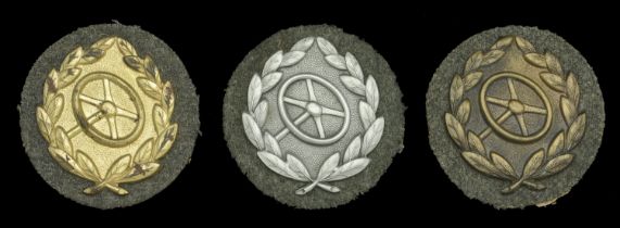 Wehrmacht Driver's Badges in Presentation Packets. Three examples, the first 'Gold' on fiel...