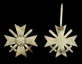 A War Service Cross First Class with Swords. A scarce variant early type, in excellent qual...