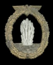 A German Second World War Kriegsmarine Mine Sweeper Badge. Generally good condition with th...