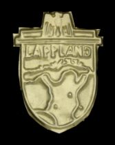 A Lappland Shield. A scarce example of the type made in Norway from a stamped-out chocolate...