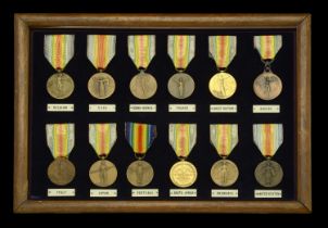 Allied Victory Medals. A glazed display frame containing the Allied Victory Medals from Bel...