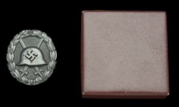 A M.1936 Spanish Civil War Wound Badge in Black in Presentation Case. An exceptional qualit...