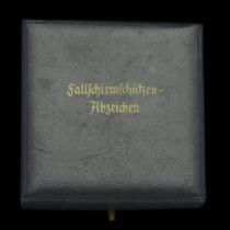 A Luftwaffe Parachutist's Badge Presentation Case. The case is the late type, covered in bl...