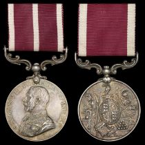 Pair: Quartermaster Sergeant J. Hicks, Royal Artillery, who served a remarkable 34 years wit...
