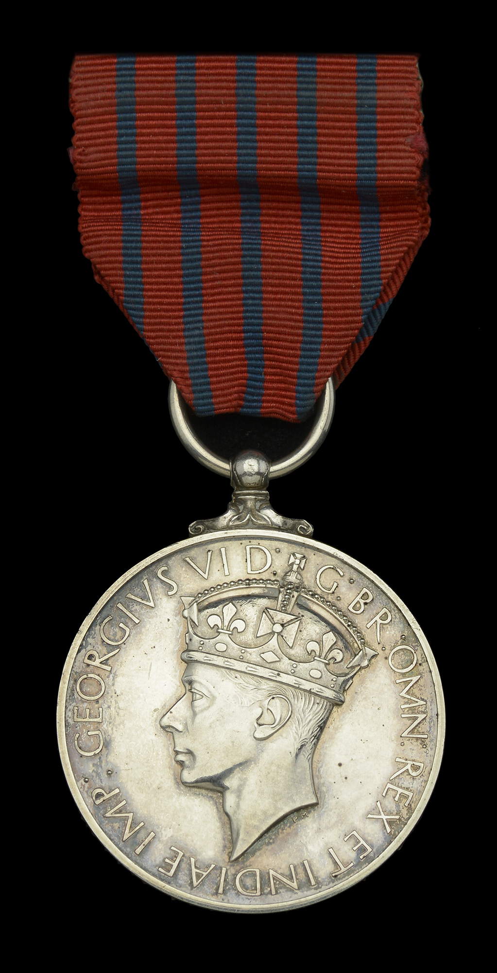 A good Second War G.M. awarded to Mr. R. E. Robinson, a Draughtsman with the Gas Light and C...