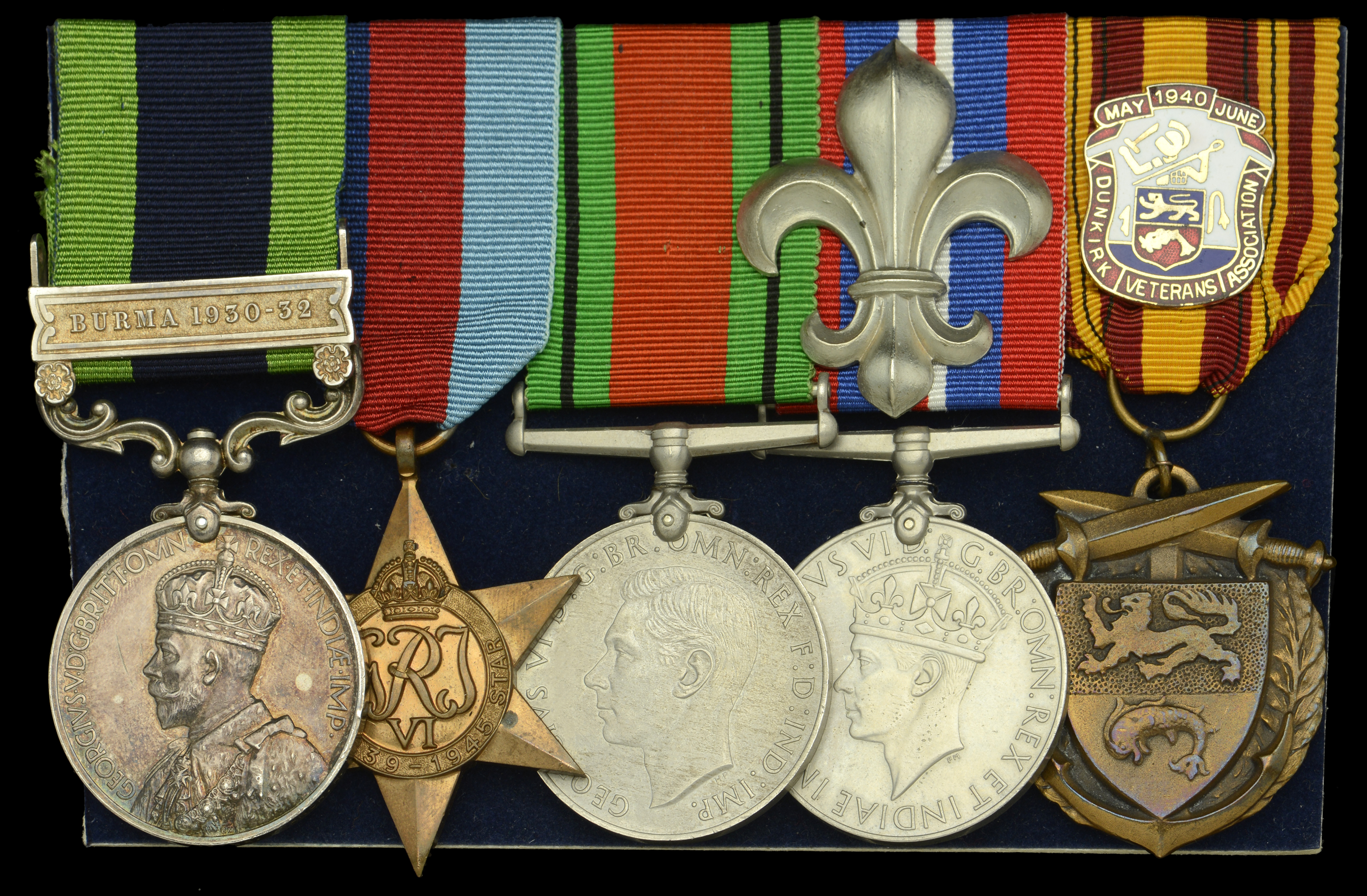 Four: Private G. Woodfine, Manchester Regiment India General Service 1908-35, 1 clasp, Bu...