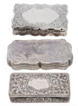 Three Victoria silver snuff boxes, the first of shaped rectangular form, the lid with vacant...