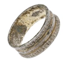 A post Medieval silver gilt band ring, 15th century, the broad band with plain convex centre...