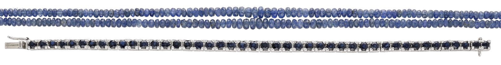 A sapphire bead necklace and sapphire line bracelet, the graduated double strand of faceted...