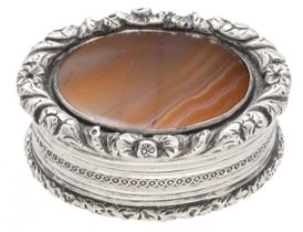 A George IV silver and agate vinaigrette, of oval form, the central agate panel within cast...