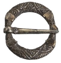 A 13th century silver gilt annular brooch buckle, the frame designed with two pairs of anima...