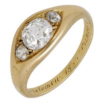 A mid 19th century diamond three stone ring, the principal old brilliant-cut diamond between...