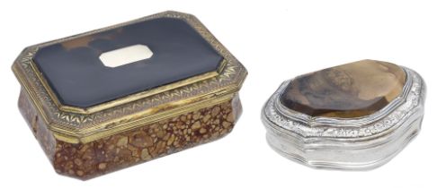 An 18th century silver mounted agate snuff box, of cartouche form, the shaped agate panel wi...