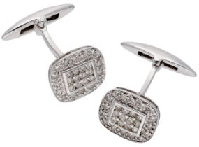 A pair of diamond cufflinks, the cushion-shaped plaques pavÃ©-set throughout with brilliant-c...