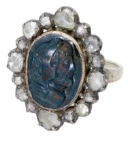 An early 19th century bloodstone intaglio and diamond ring, the oval bloodstone carved to...