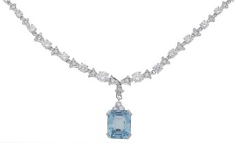 An aquamarine and diamond necklace, the curb-link chain leading to a brilliant-cut...