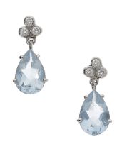 A pair of aquamarine and diamond earrings, the brilliant-cut diamond trefoil surmounts...