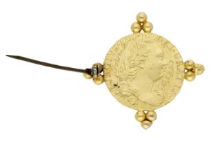 A gold coin brooch, the George III guinea, 1776, mounted as a brooch with trefoil bead...