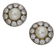 A pair of cultured pearl and diamond ear studs, each cluster set with a half cultured pearl...