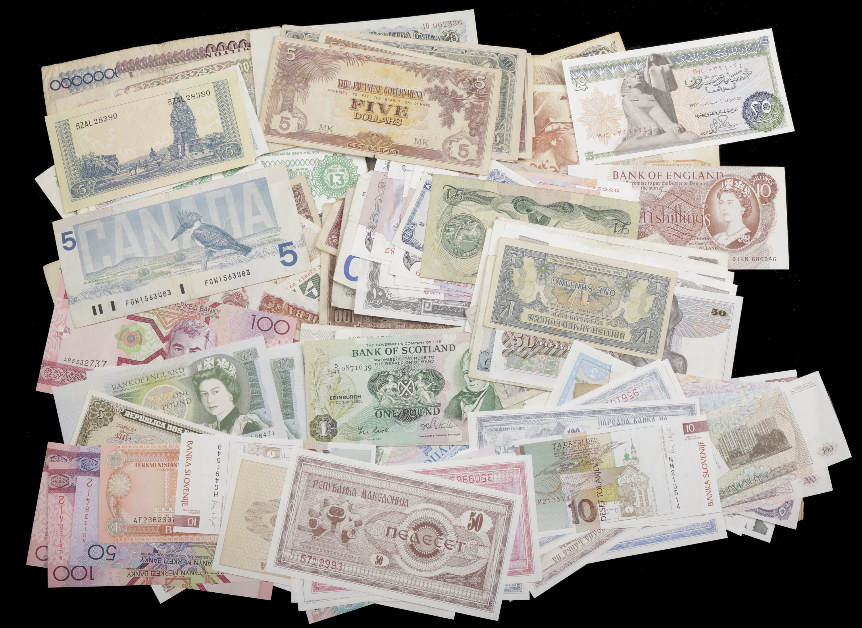 A group of more modern British and World banknotes, including Bank of England, Scotland,...