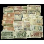 A Group of World Banknotes, including Saudi Arabia, Iran, Iraq, Qatar, India, various parts...