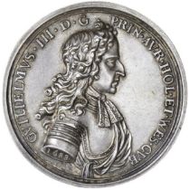 Landing of William III at Torbay, 1688, a cast silver medal by G. Bower, armoured and draped...