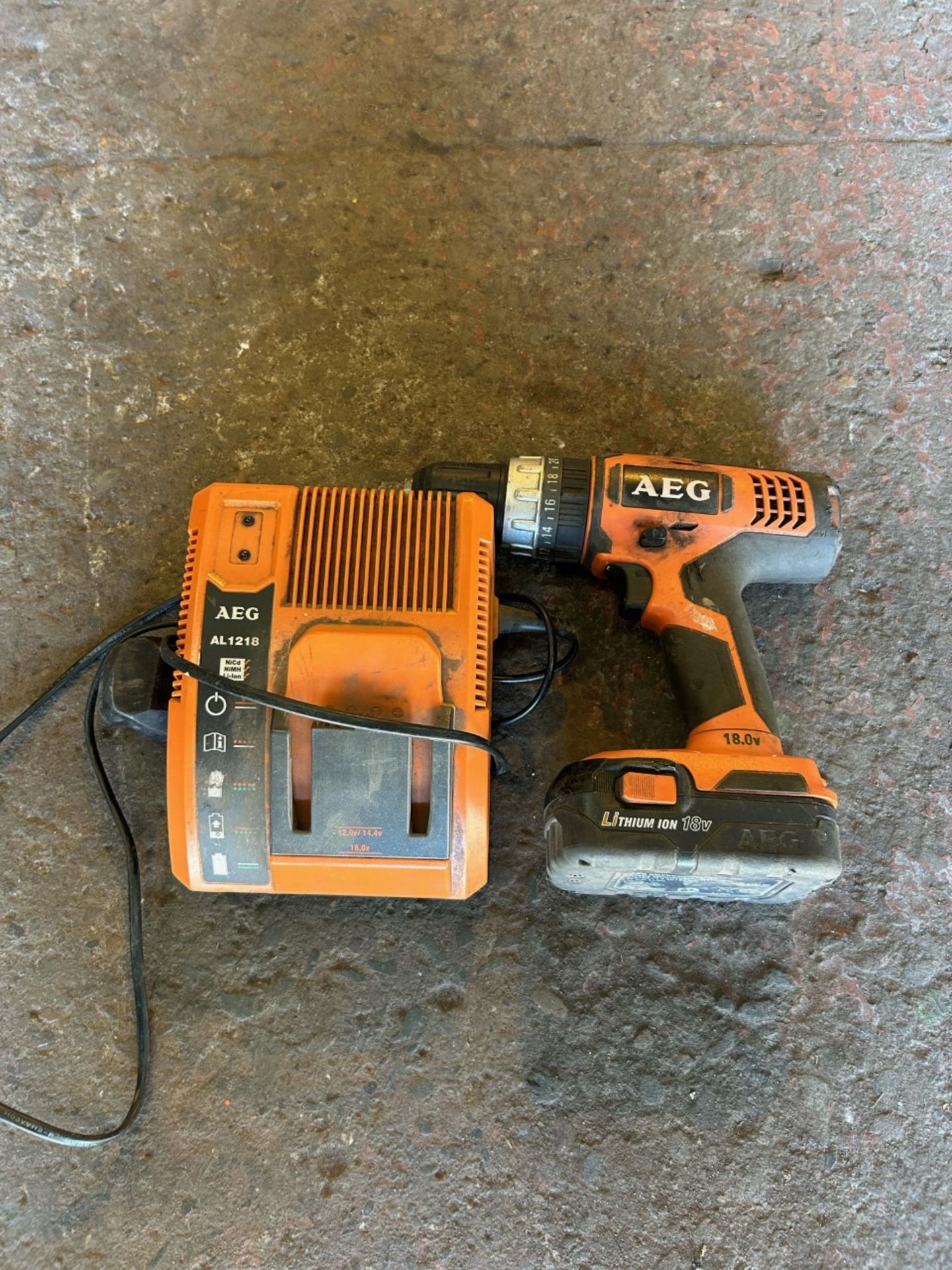 18v AEG drill with battery and charger. Battery is weak