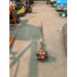 Husqvarna 327HE4X long reach hedge trimmer.