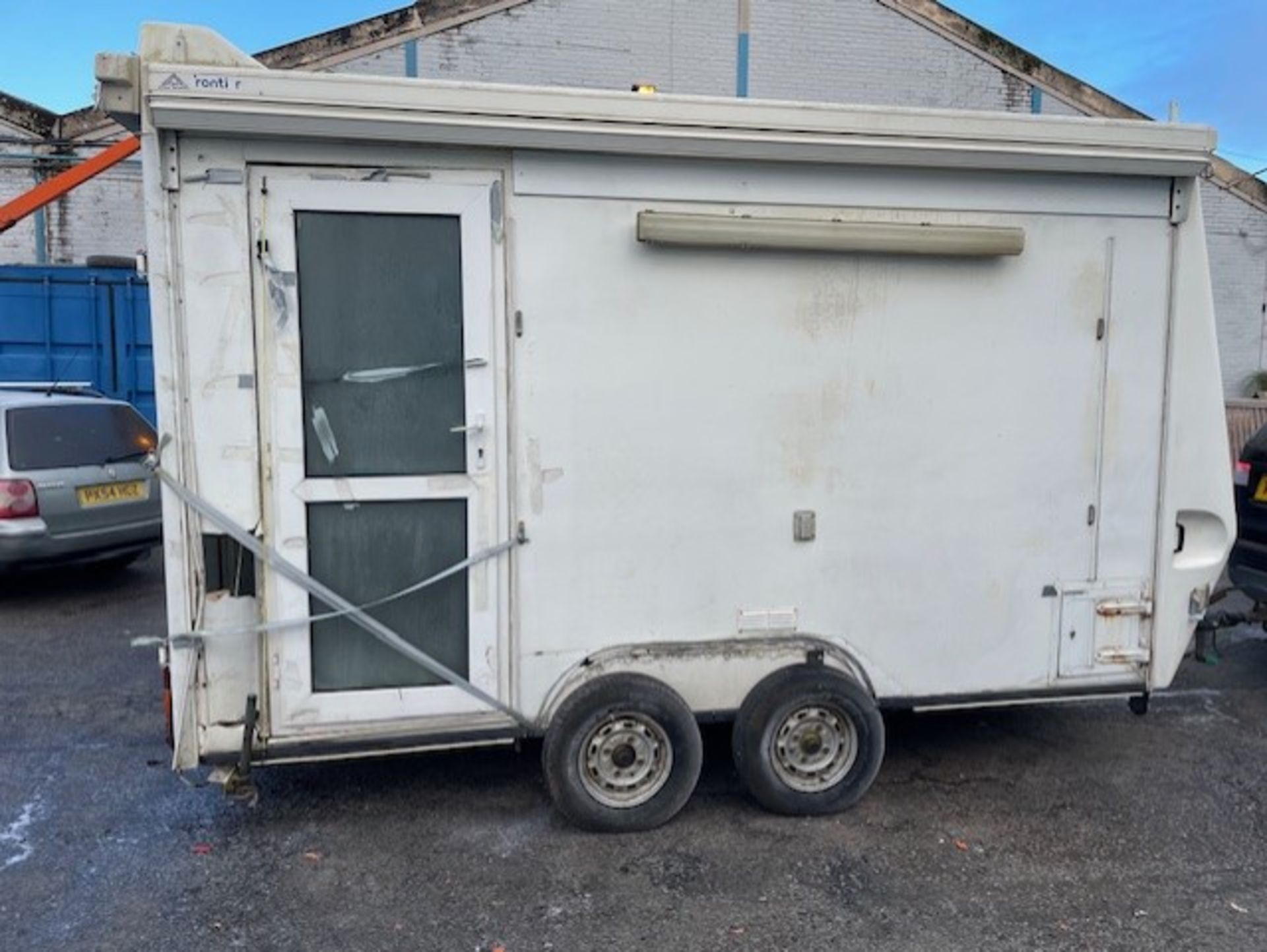 Trailer that was used for shows come complete with three awnings tows lights but needs a tad
