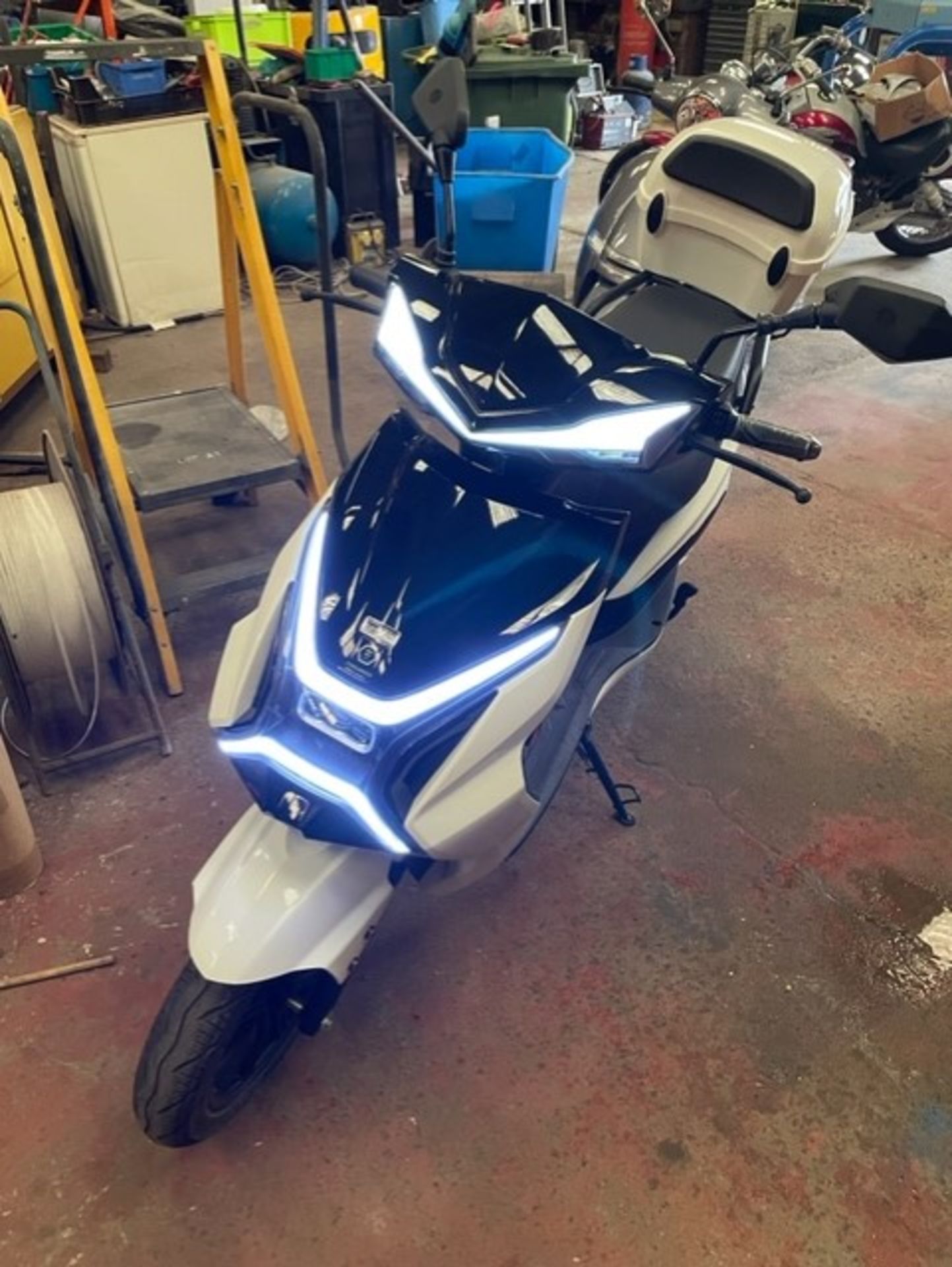 Only 1 mile on the clock we have a beautiful unused fully electric scooter with carry box it is