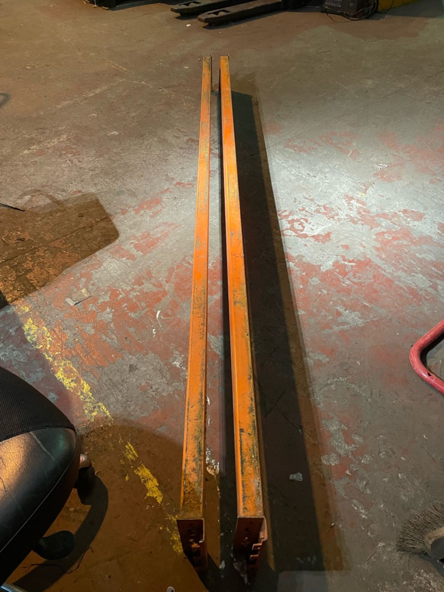 2x Orange racking beams. 2700mm in length. Good condition all connections are straight