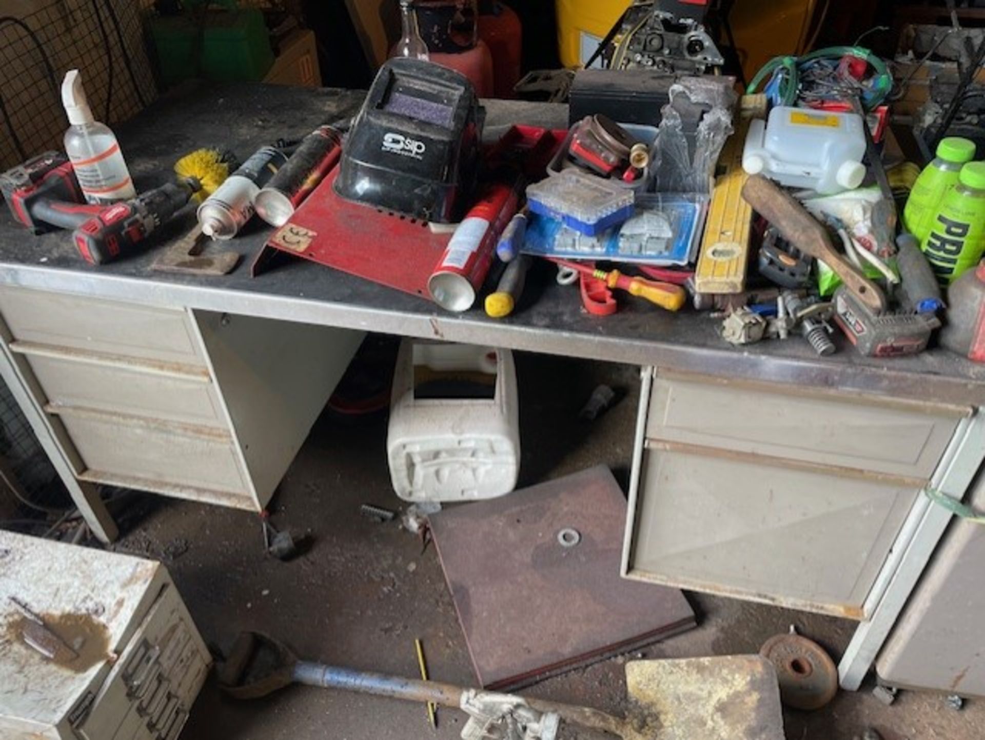 Good solid metal desk contents ontop not included all draws do what they should no major dings or