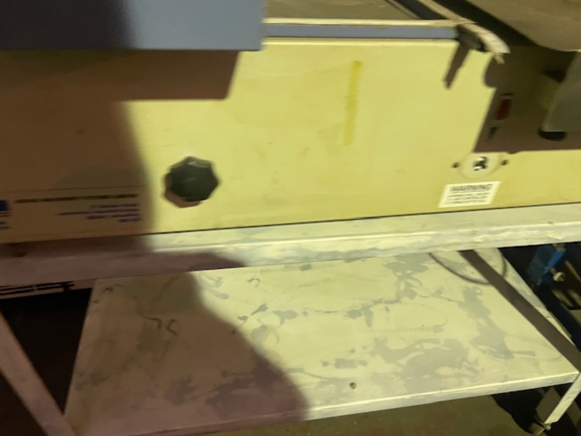 Heat sealing machine for sealing bags along with elevator for moving package on has been sat around - Image 6 of 6