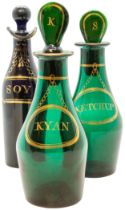 TWO GREEN GLASS CONDIMENT BOTTLES 18TH CENTURY Each with gilded labels, one marked 'KETCHUP', the