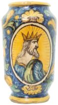 AN ITALIAN FAIENCE ARBARELLO 17TH CENTURY With oval reserve painted with a bearded monarch, on