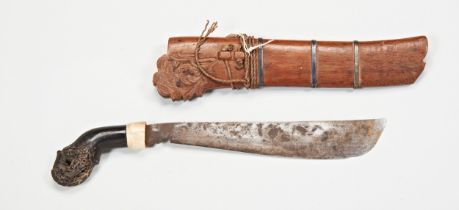 AN INDONESIAN KRIS, the blade of plain form, possibly matched to it’s carved warangka and with a