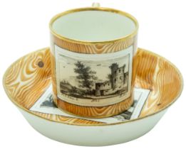 A VIENNA 'FAUX BOIS' CUP AND SAUCER CIRCA 1790 Decorated with faux bois ground and tromp l'oeil