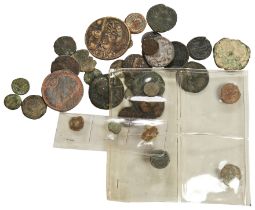 A DIOCLETIAN BRONZE FOLLIS and other assorted Roman bronze coins and Roman style coins.