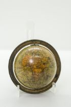 A CAREYS THREE INCH 'POCKET' GLOBE with calibrated brass meridian the map cartouche with 18th