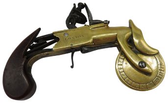 A FLINTLOCK POWDER TESTER WITH BRASS FRAME AND INDICATOR WHEEL and slab handled grip (Now damaged)