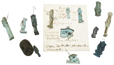 A COLLECTION OF FINE EGYPTIAN FAIENCE AMULET BEADS. Including bess, sekhmet, a pylon and a card with