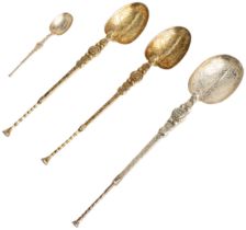 FOUR SILVER-GILT REPRODUCTION ANOINTING SPOONS, C.1902 25.8 cm, 23 cm. & 11 cm.