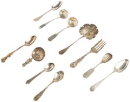 A COLLECTION OF CONTINENTAL SPOONS AND SERVERS 518 g.