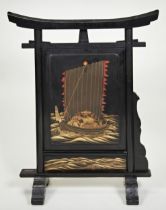 A JAPANESE BLACK LACQUER SCREEN MEIJI PERIOD (1868-1912) in the form of a Torii 90cm high