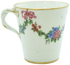 A SEVRES TREMBLEUSE CUP DATE LETTER 'L' FOR 1764 Decorated with floral swags held by blue ribbons,