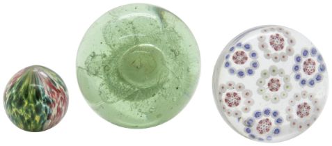 A MILLEFIORE PAPERWEIGHT 19th century with seven concentric circles, together with a 'Sunderland'