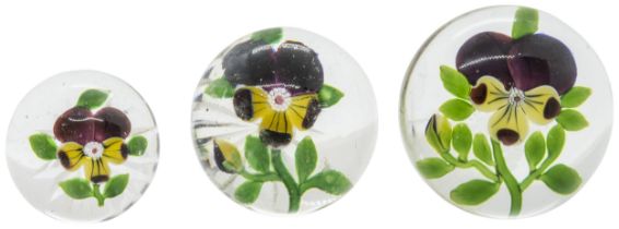 THREE BACCARAT PANSY PAPERWEIGHTS 19th Century, largest is 7.5cms wide