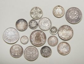 A 1905 SILVER ONE YEN, a 1909 50 Sen with solder mark, two silver rupees and various other coins.